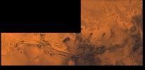 Valles Marineris, the great canyon and the south Chryse basin-Valles Marineris outflow channels of Mars. This scene shows the entire Valles Marineris canyon system extending from Noctis Labyrinthus, as seen by NASA's Viking spacecraft.
