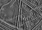 This close-up view of the icy surface of Europa, a moon of Jupiter, was obtained on December 20, 1996, by the Solid State Imaging system on board NASA's Galileo spacecraft during its fourth orbit around Jupiter.