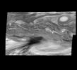 This photographic mosaic of images covering an area of 34,000 kilometers by 22,000 kilometers (about 21,100 by 13,600 miles) in Jupiter's equatorial region was taken by NASA's Galileo orbiter on December 17, 1996.