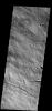 This image shows a small portion of the flank of Ascraeus Mons on Mars, taken by NASA's Mars 2001 Odyssey spacecraft.