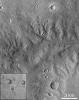 NASA's Mars Global Surveyor shows a portion of dissected terrain southeast of Parana Valles on Mars.