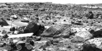 This is the left image of a stereo image pair taken on the afternoon of Sol 71 (September 14) shows NASA's Sojourner leaving the 'Rock Garden,' an assemblage of large rocks behind and to the right of the rover. Sol 1 began on July 4, 1997.