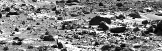 This image mosaic taken by NASA's Imager for Mars Pathfinder (IMP) shows the Sojourner rover near the large rock 'Chimp' on the afternoon of Sol 72 (September 15). Sol 1 began on July 4, 1997.