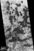 NASA's Mars Global Surveyor shows classic, crescentic shape of the dark barchan dunes on Mars.
