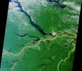 Close to the city of Manaus, Brazil the Rio Solimoes and the Rio Negro converge to form the Amazon River. This image from NASA's Terra satellite was acquired on July 23, 2000 during Terra orbit 3178. 