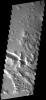 These fractures and graben are part of Gordii Fossae, a large region on Mars that has undergone stresses which have cracked the surface as seen by NASA's 2001 Mars Odyssey spacecraft.