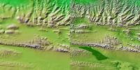 These two images show exactly the same area, part of the Kunlun fault in northern Tibet as seen by NASA's Shuttle Radar Topography Mission.