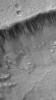NASA's Mars Global Surveyor shows a suite of south mid-latitude gullies on a crater wall on Mars. Gullies such as these may have formed by runoff of liquid water.