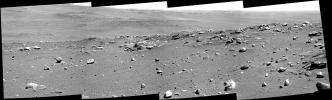 This view combines four frames from Spirit's panoramic camera, looking in the drive direction on the rover's 680th Martian day, or sol (Dec. 1, 2005). 'Algonquin' is the information name given to the outcrop of apparently layered bedrock.