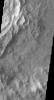 This image from NASA's Mars Odyssey spacecraft shows that dust avalanches, also called slope streaks, occur on many Martian terrains. This region of dust avalanches is located in and around a crater to the west of Tikhonravov Crater.