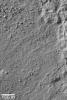 NASA's Mars Global Surveyor shows part of the boulder-strewn surface of an ejecta deposit from a meteor impact crater in Noachis Terra on Mars.