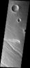 NASA's Mars Odyssey spacecraft captured this image in August 2003, showing several linear cross-cutting grabens and collapse features on Mars.