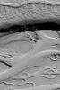 This image from NASA's Mars Global Surveyor shows some of the complex flow and channel features of the Olympica Fossae region on Mars in northern Tharsis. 