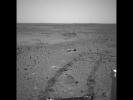 NASA's Mars Exploration Rover Spirit drove itself 3 feet out of 21 feet at Gusev Crater, Mars, on Feb. 8, 2004. This image shows the tracks it created in the martian soil as it drove straight ahead, then to the left.