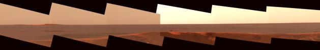This image mosaic from the panoramic camera on NASA's Mars Exploration Rover Opportunity shows the distant horizon from Opportunity's position inside a small crater at Meridiani Planum, Mars.