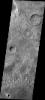This image from NASA's 2001 Mars Odyssey released on March 16, 2004 shows three craters on Mars representing possibly three different ages of creaters, the youngest being the crater in the lower left which contains dunes.