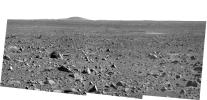 NASA's Mars Exploration Rover Spirit took this panoramic camera image on March 31, 2004 before driving 36 meters (118 feet) on sol 87 toward its future destination, the Columbia Hills. The large hill on the horizon is Grissom Hill.
