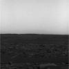 NASA's Mars Exploration Rover Spirit took this panoramic camera image of the southeast rim of Gusev Crater capturing the crater wall as it descends into the mouth of the Ma'adim Vallis channel. The martian skies were dusty obscuring the crater rim.