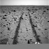 Following a long drive, NASA's Mars Exploration Rover Spirit took this backwards glance at its tracks across the rocky martian landscape on sol 90 of its mission on April 4, 2004.