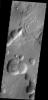 This image from NASA's Mars Odyssey is from the Cydonia region of Mars. It illustrates how difficult it can be to identify modified impact craters in a region of collapse pits/craters. Generally collapse craters/pits have no rims and form lines.
