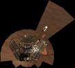 This image taken on Dec. 19 and 20, 2004 by NASA's Mars Exploration Rover Opportunity shows the downward-looking view omits the mast on which the camera is mounted. It shows Opportunity's solar panels to be relatively dust-free.
