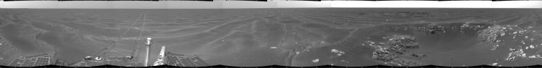 NASA's Mars Exploration Rover Opportunity took this view of its surroundings on Feb. 24, 2005. Opportunity had reached the eastern edge of a small crater dubbed 'Naturaliste,' seen in the right foreground.