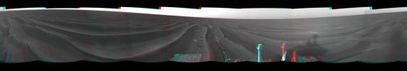 On Feb. 19, 2005, NASA's Mars Exploration Rover Opportunity set a one-day distance record for martian driving; Opportunity rolled 177.5 meters (582 feet) across the plain of Meridiani. 3D glasses are necessary to view this image.