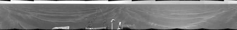 NASA's Mars Exploration Rover Opportunity took this cylindrical projection 360-degree view of the rover's surroundings on March 6, 2005. Opportunity had completed a drive across the rippled flatland of the Meridiani Planum region.
