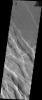 This image taken by NASA's Mars Odyssey shows graben in the region between Arsia Mons and Syria Planum on Mars. The older northeast trending graben have been cut by the younger southeast trending graben.