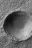 NASA's Mars Global Surveyor shows a crater in southern winter with frost deposits on a northern wall on Mars.