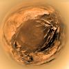 This poster is a stereographic (fish-eye) projection taken with the descent imager/spectral radiometer onboard the European Space Agency's Huygens probe, when the probe was about 5 kilometers (3 miles) above Titan's surface.