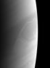 Saturn's atmosphere produces beautiful and sometimes perplexing features. The bright feature below center may be a rare crossing of a feature from a zone to a belt, as seen by NASA's Cassini spacecraft.