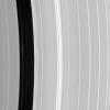 In this image from NASA's Cassini spacecraft there is a bright clump-like feature visible within the Encke Division. Also discernible are periodic brightness variations along the outer (right side) gap edge.