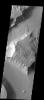 This image of Tiu Vallis shows a landslide on Mars that crossed the entire width of the channel as seen by NASA's 2001 Mars Odyssey spacecraft.