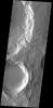 This unnamed crater in Terra Sabaea has two channels dissecting the rim which have formed deltas on the crater floor on Mars as seen by NASA's Mars Odyssey spacecraft.
