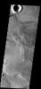 This image from NASA's Mars Odyssey spacecraft shows windstreaks located of Arsia Mons lava flows in the Daedalia Planum region.