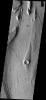 This image from NASA's Mars Odyssey spacecraft shows part of Managala Vallis on Mars, including a streamlined island. The narrow tail of the island points downstream.