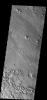 This image from NASA's Mars Odyssey spacecraft shows Aeolis Planum and the long term effect of wind on soft/poorly cemented material. Stretching from just south of Olympus Mons to Aeolis Planum is a region called the Medusa Fossae Formation.