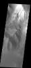 This image from NASA's Mars Odyssey spacecraft shows Coprates Chasma. The top of the canyon walls are clearly visible, while the floor is indistinct due to hazy conditions.