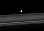 On Dec. 2, 1007, NASA's Cassini spacecraft spied two of Saturn's small moons, Atlas and Epimetheus, that skirt the edges of the planet's rings.