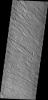 This image from NASA's Mars Odyssey spacecraft shows linear texture of Aeolis Planum created by wind erosion on Mars.