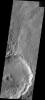 This image from NASA's Mars Odyssey shows numerous gullies dissecting the northeastern rim of this unnamed crater in Noachis Terra.
