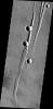 This image from NASA's Mars Odyssey shows two craters on a graben on Mars.