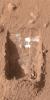 NASA's Phoenix Mars Lander shows the trench, called 'Dodo-Goldilocks,' lacking lumps of ice seen previously. The ice had sublimated, a process similar to evaporation, over the course of four days.