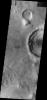 This image from NASA's Mars Odyssey shows dark dunes located on the floor of the unnamed crater just off the eastern margin of Terra Sabaea.