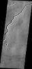 This image from NASA's Mars Odyssey shows a narrow channel in Ituxi Vallis, a lava channel east of Elysium Mons.