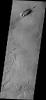 This image from NASA's Mars Odyssey shows an individual windstreak located on the extensive volcanic flows of the Tharsis region.