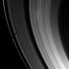 Saturn's moon Tethys casts a wide shadow over the planet's F and A rings. Tethys itself is not visible in this image taken by NASA's Cassini spacecraft taken on Apr. 21, 2009.