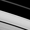 Saturn's moon Daphnis creates waves of disturbance in the Keeler Gap in this image of the wide A ring and narrow F ring in this image taken by NASA's Cassini spacecraft on Mar. 30, 2009.