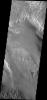 This image shows a small portion of the floor deposits within Melas Chasmaon Mars as seen by NASA's Mars Odyssey spacecraft.